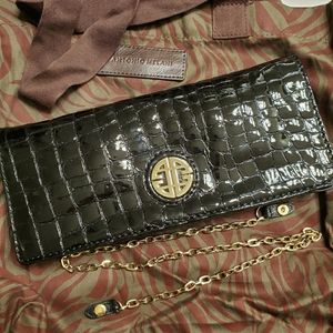 Crocodile embossed patent leather clutch